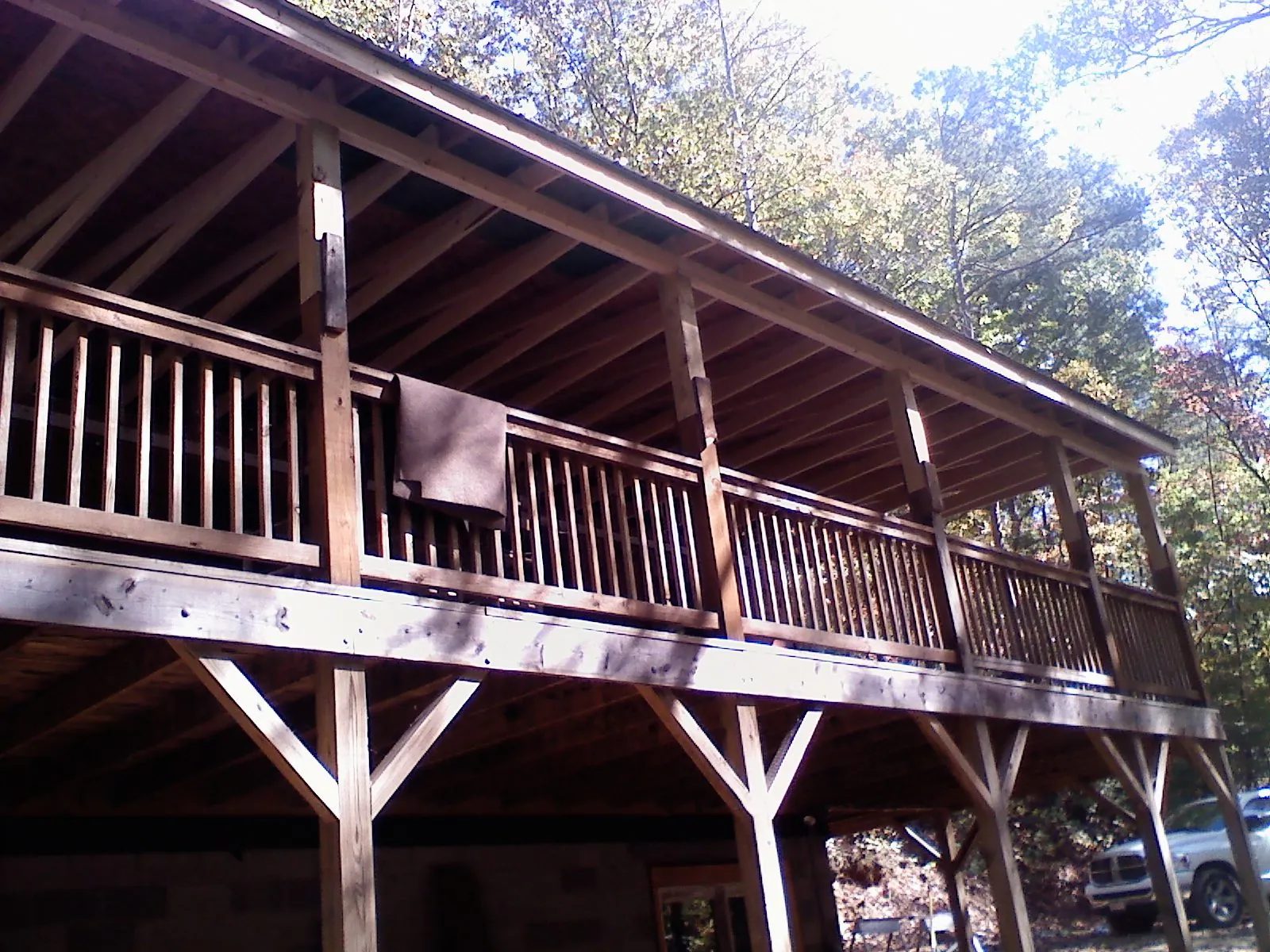 Timber framing under a new elevated porch and deck — Roof Leak Repair in West Milton by Roofing Brothers